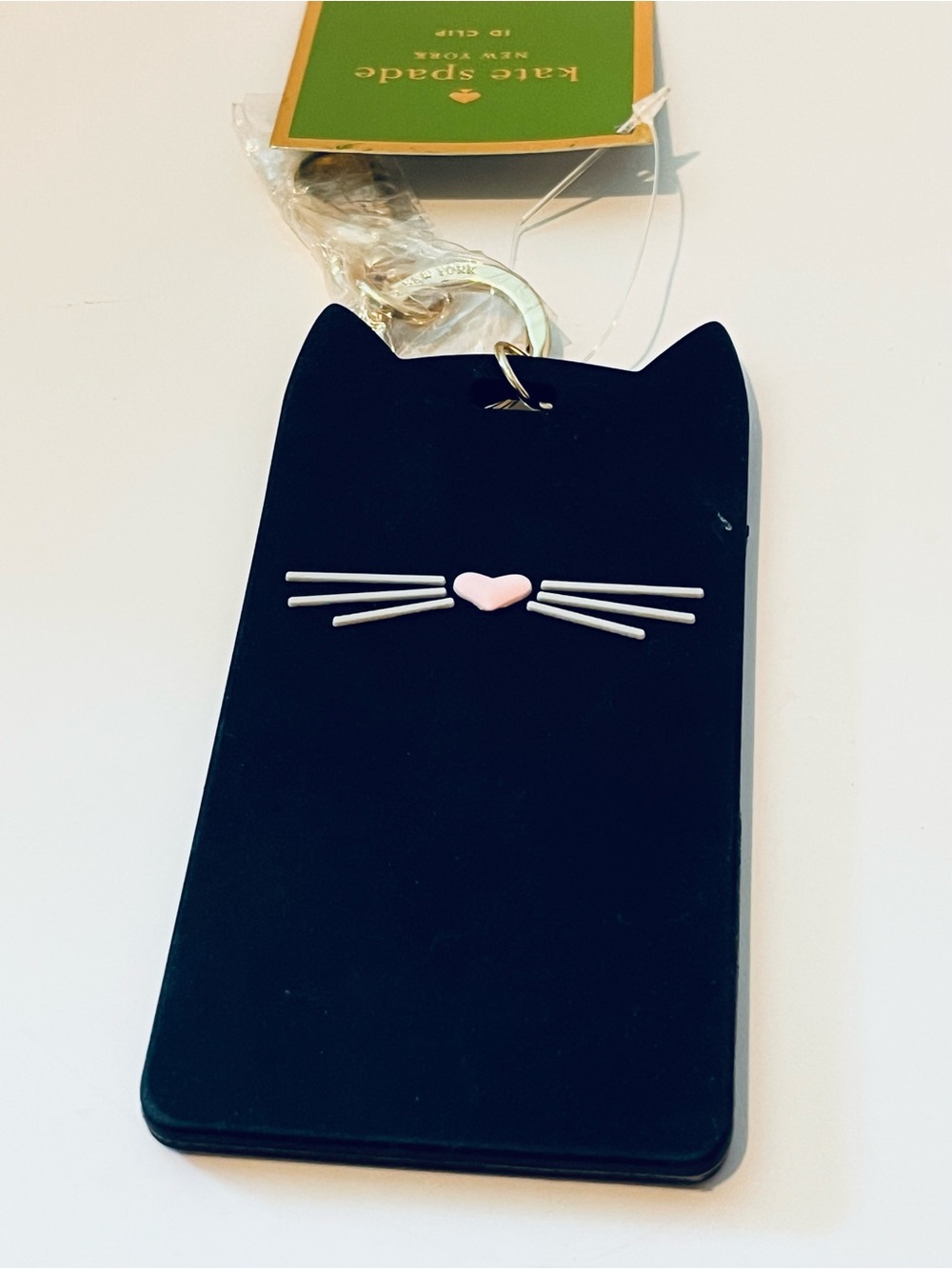 kate spade black cat luggage tag with pink heart nose and white whiskers
